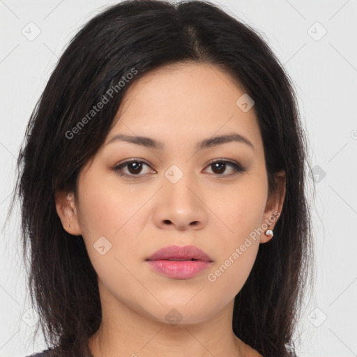 Joyful asian young-adult female with long  brown hair and brown eyes