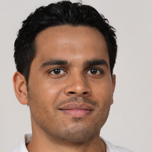 Neutral latino young-adult male with short  black hair and brown eyes