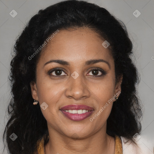 Joyful black young-adult female with long  brown hair and brown eyes