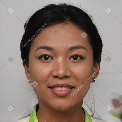 Joyful asian young-adult female with short  brown hair and brown eyes