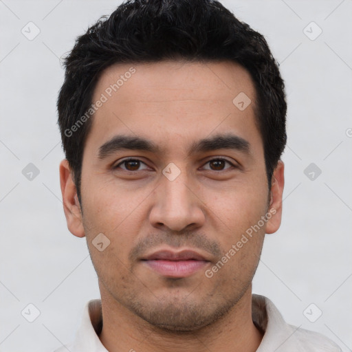 Joyful white young-adult male with short  black hair and brown eyes