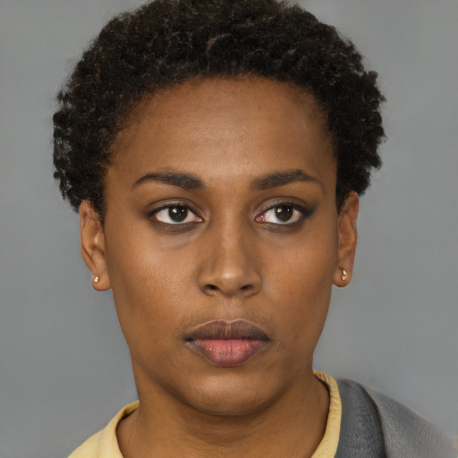 Neutral black young-adult female with short  brown hair and brown eyes
