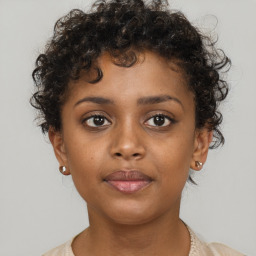 Neutral black young-adult female with short  brown hair and brown eyes