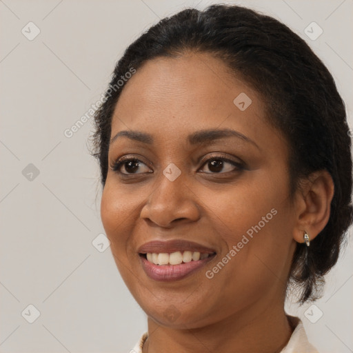 Joyful black young-adult female with medium  brown hair and brown eyes