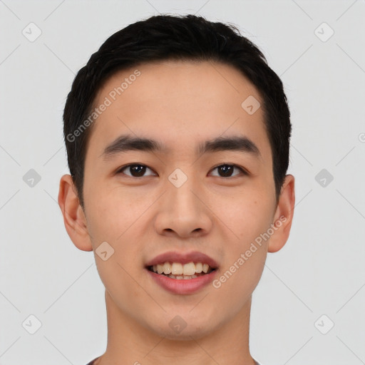 Joyful asian young-adult male with short  black hair and brown eyes