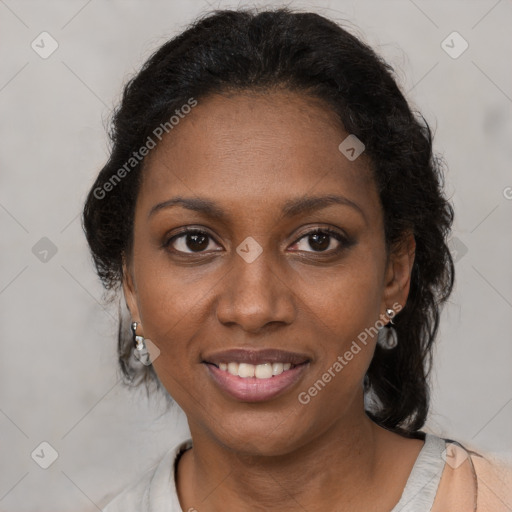 Joyful black young-adult female with medium  brown hair and brown eyes