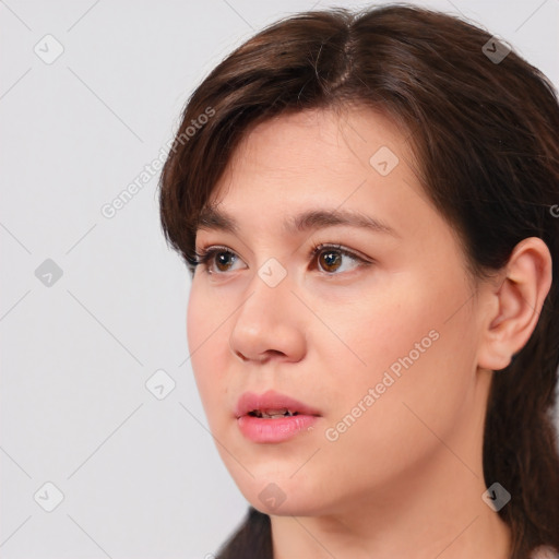 Neutral white young-adult female with medium  brown hair and brown eyes