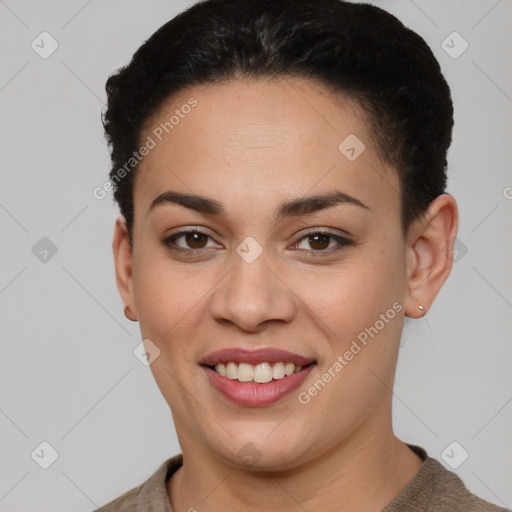 Joyful latino young-adult female with short  brown hair and brown eyes