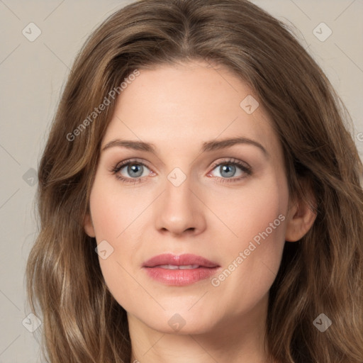 Joyful white young-adult female with long  brown hair and green eyes