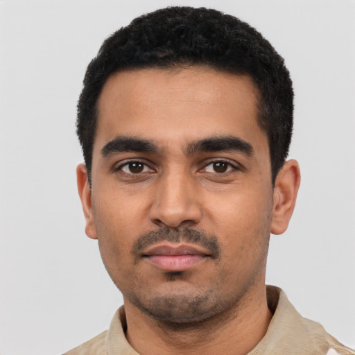 Neutral latino young-adult male with short  black hair and brown eyes