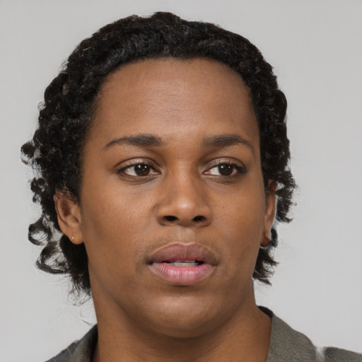 Neutral black young-adult female with short  black hair and brown eyes