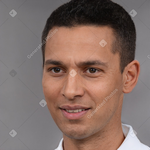 Joyful white adult male with short  brown hair and brown eyes