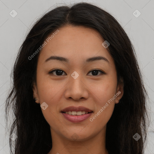 Joyful asian young-adult female with long  brown hair and brown eyes