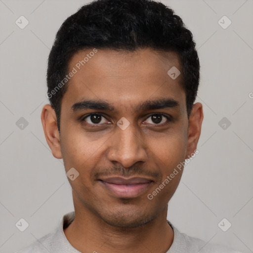 Joyful latino young-adult male with short  black hair and brown eyes