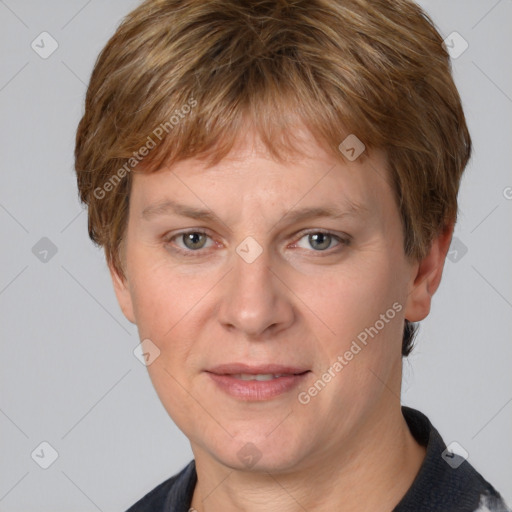 Joyful white adult male with short  brown hair and grey eyes