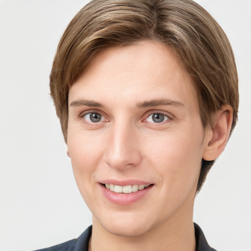 Joyful white young-adult female with short  brown hair and grey eyes