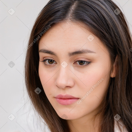 Neutral white young-adult female with long  brown hair and brown eyes