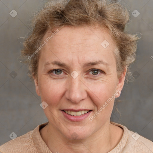 Joyful white adult female with short  brown hair and grey eyes