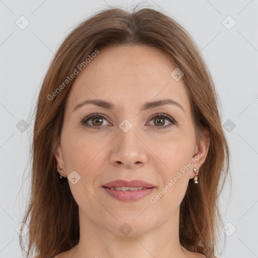 Joyful white adult female with medium  brown hair and brown eyes