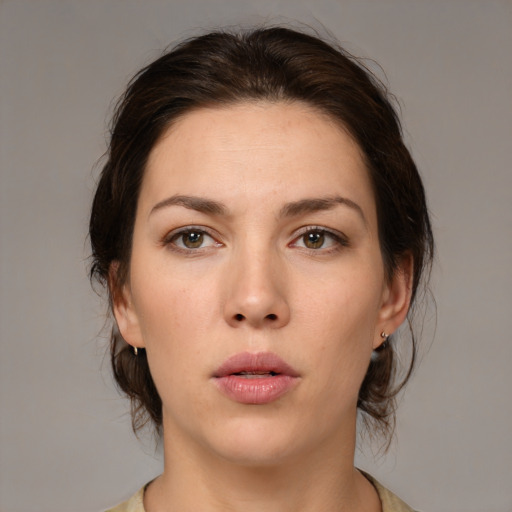 Neutral white young-adult female with medium  brown hair and brown eyes