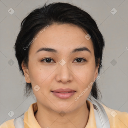 Joyful asian young-adult female with medium  black hair and brown eyes