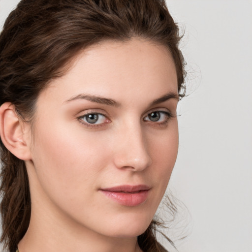 Neutral white young-adult female with medium  brown hair and grey eyes