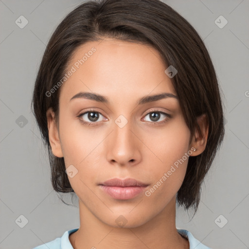 Neutral white young-adult female with medium  brown hair and brown eyes