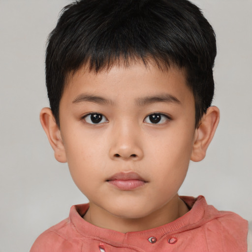Neutral asian child male with short  brown hair and brown eyes