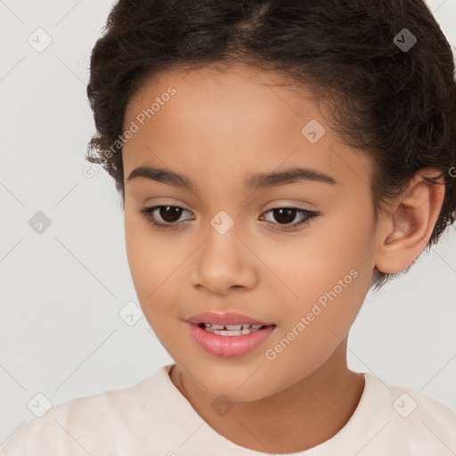 Joyful white child female with short  brown hair and brown eyes