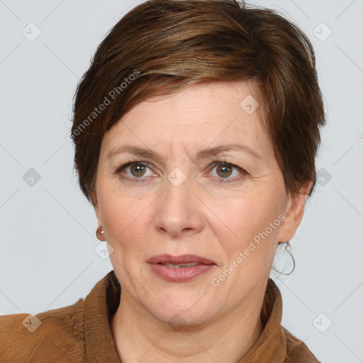 Joyful white adult female with medium  brown hair and grey eyes