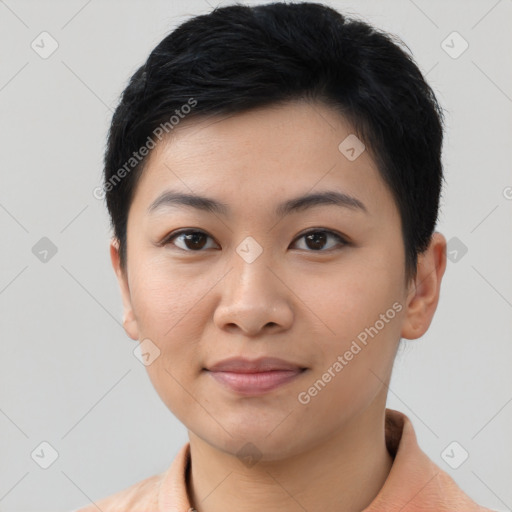 Joyful asian young-adult female with short  black hair and brown eyes