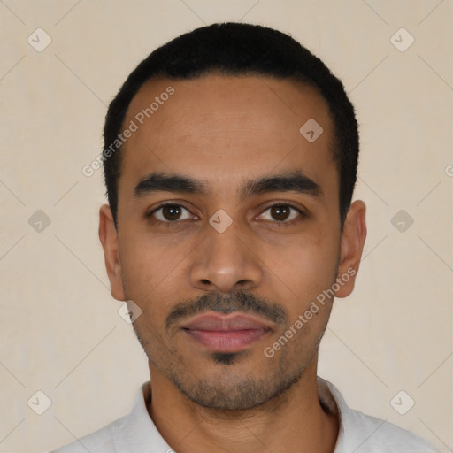 Neutral latino young-adult male with short  black hair and brown eyes