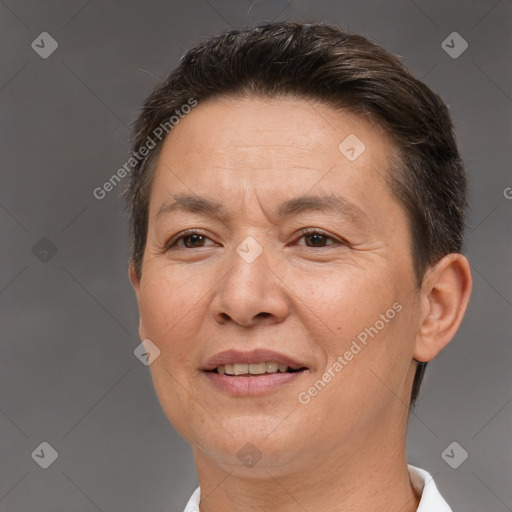 Joyful white adult female with short  brown hair and brown eyes