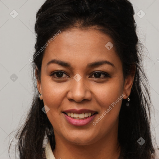 Joyful latino young-adult female with long  brown hair and brown eyes