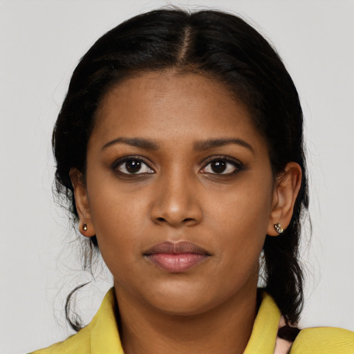 Neutral black young-adult female with medium  black hair and brown eyes