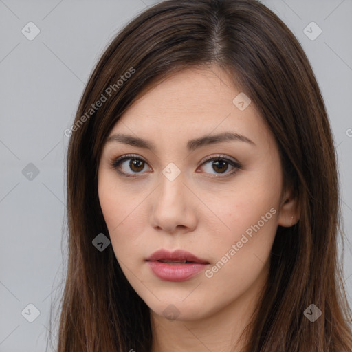 Neutral white young-adult female with long  brown hair and brown eyes