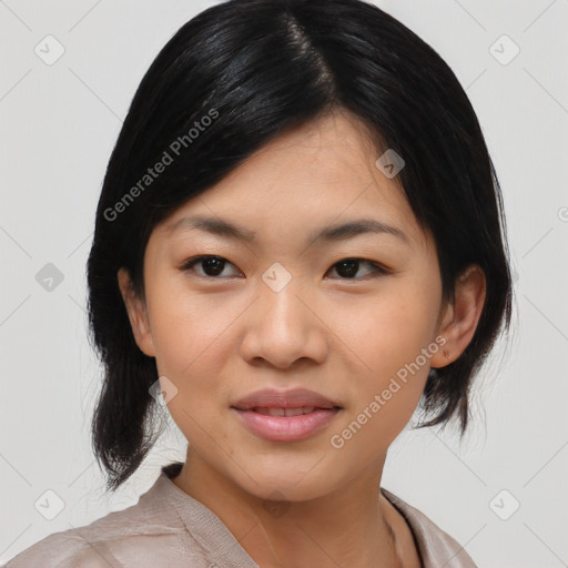 Joyful asian young-adult female with medium  black hair and brown eyes