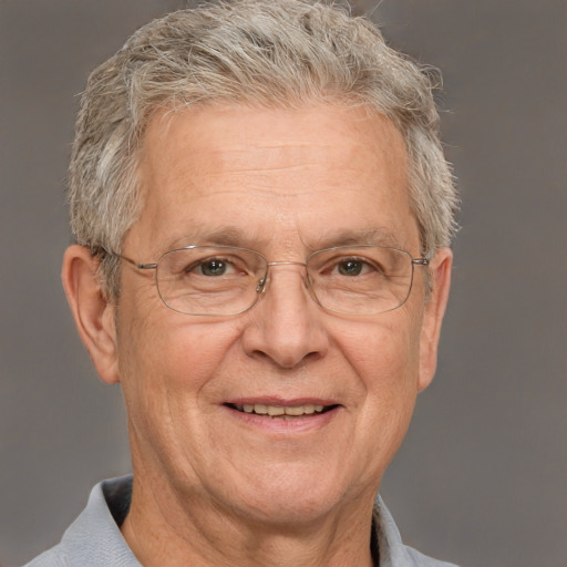 Joyful white middle-aged male with short  gray hair and grey eyes