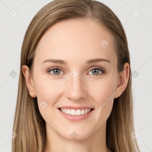 Joyful white young-adult female with long  brown hair and blue eyes