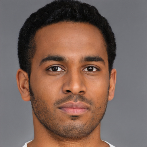 Neutral latino young-adult male with short  brown hair and brown eyes