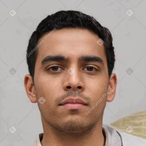 Neutral latino young-adult male with short  black hair and brown eyes