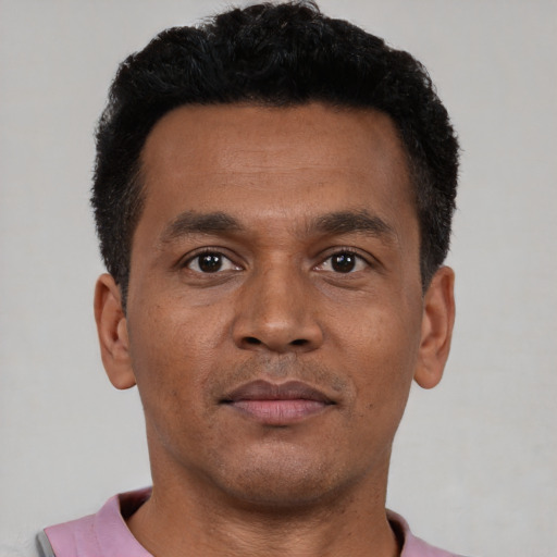Neutral black young-adult male with short  black hair and brown eyes