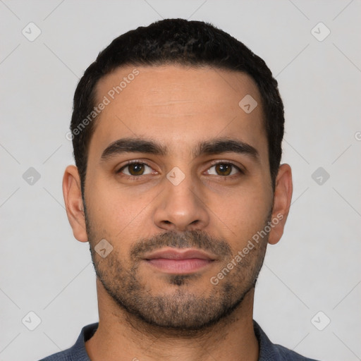 Neutral latino young-adult male with short  black hair and brown eyes