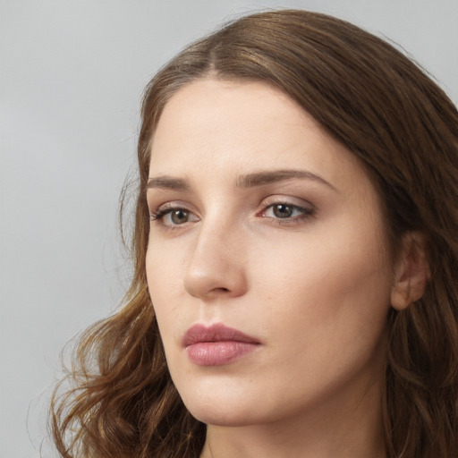 Neutral white young-adult female with long  brown hair and grey eyes