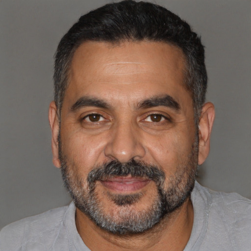 Neutral black adult male with short  black hair and brown eyes