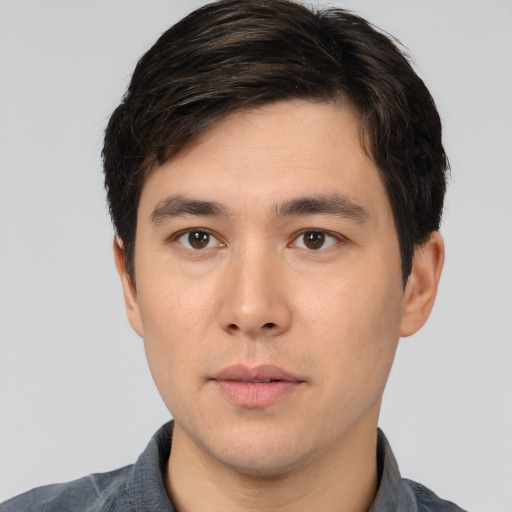 Neutral white young-adult male with short  black hair and brown eyes