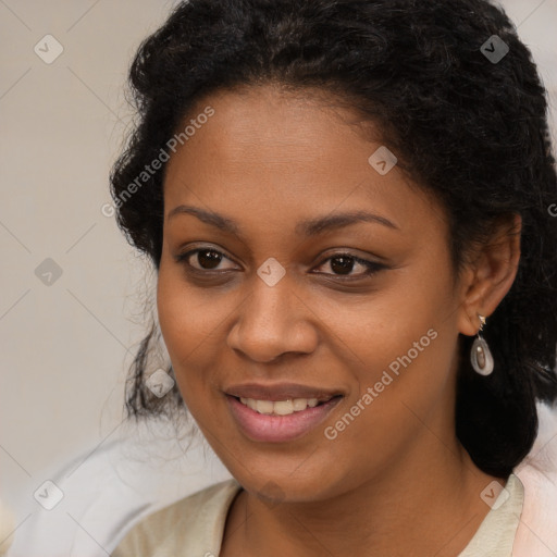 Joyful black young-adult female with medium  brown hair and brown eyes