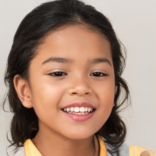 Joyful white child female with medium  brown hair and brown eyes