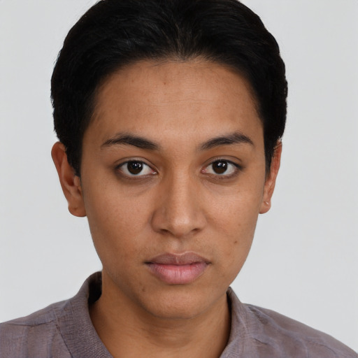Neutral latino young-adult female with short  brown hair and brown eyes