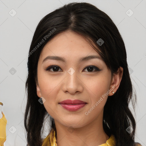 Joyful latino young-adult female with long  brown hair and brown eyes